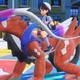 A non-spoiler image of a trainer riding on Koraidon.